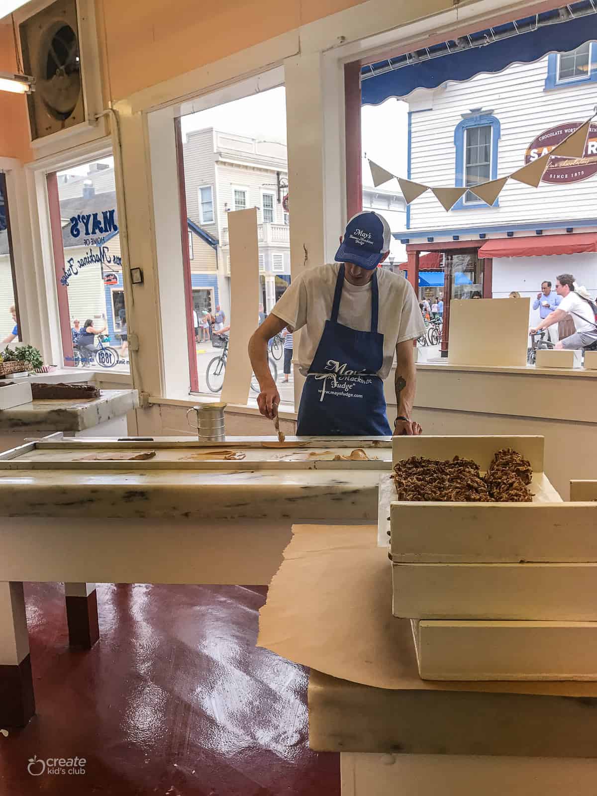 man making Mackinac fudge 