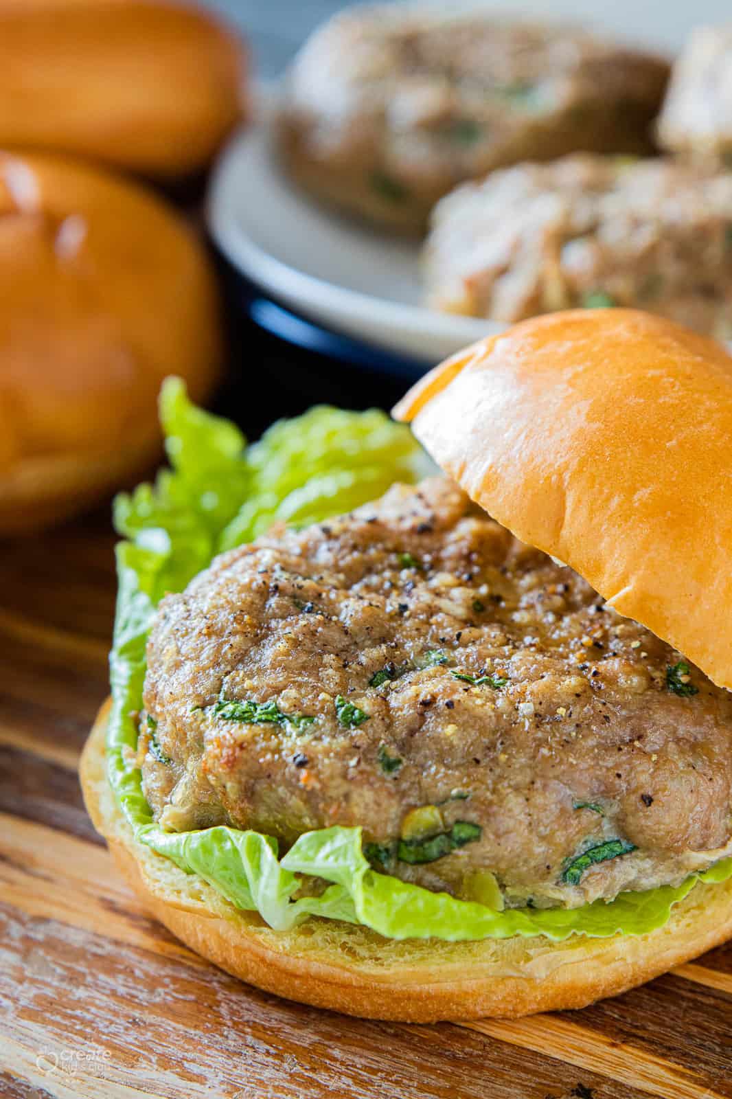 turkey burger on a bun with lettuce