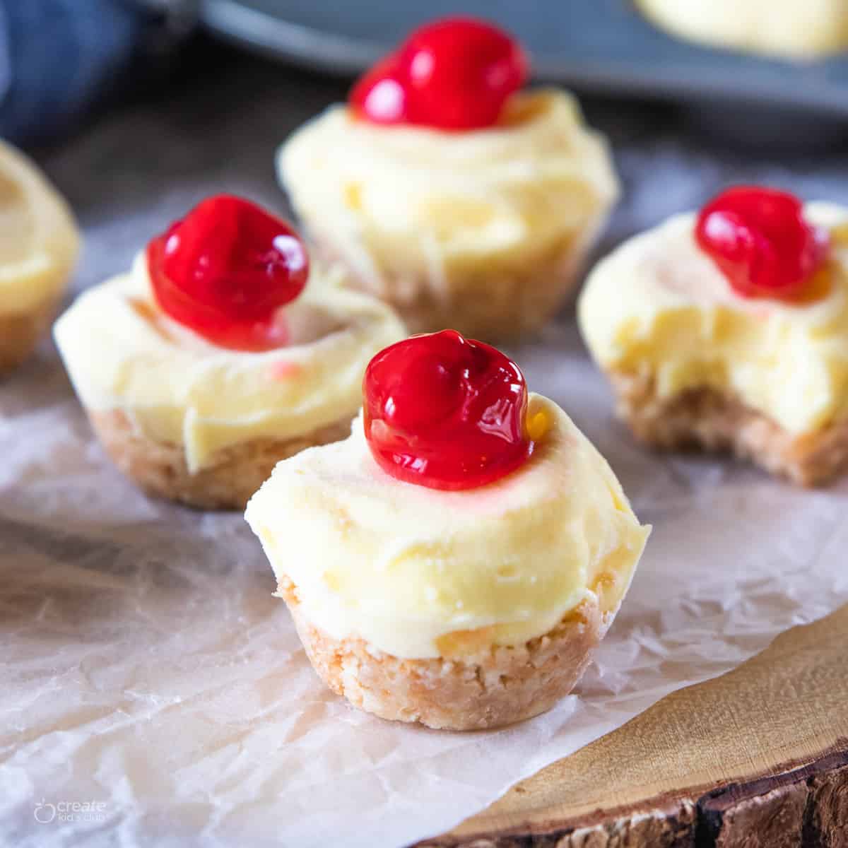 frozen cheesecake bites topped with cherries