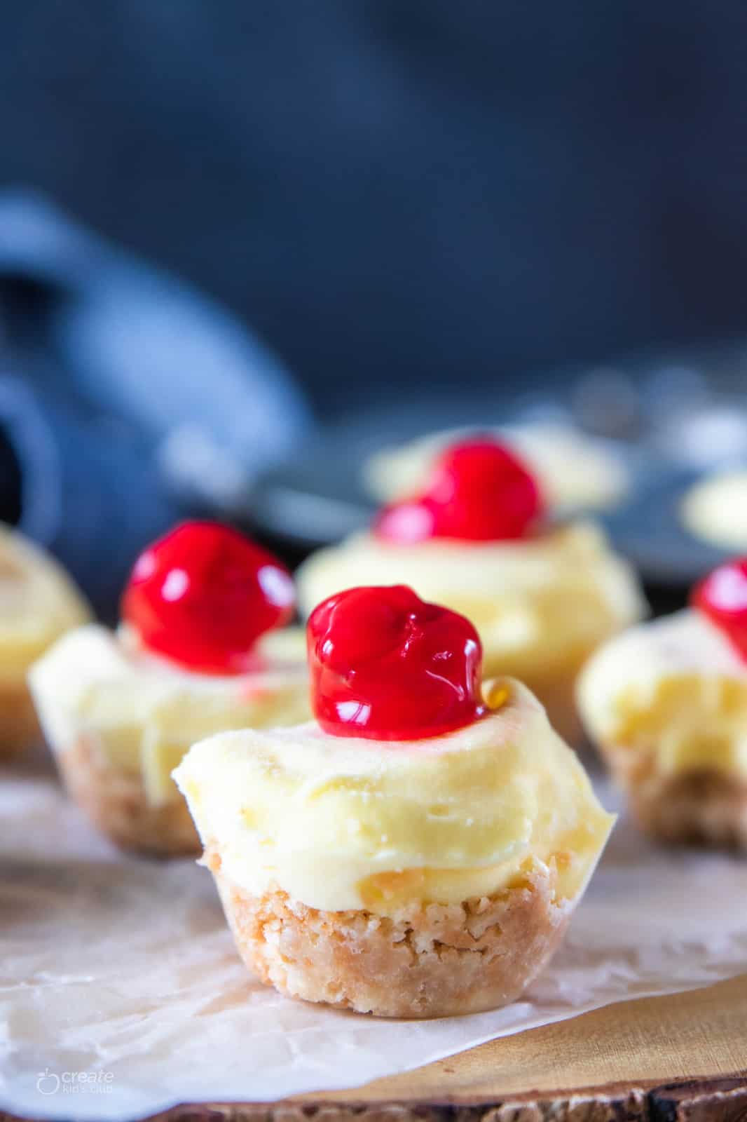cheesecake bite with cherries on top 