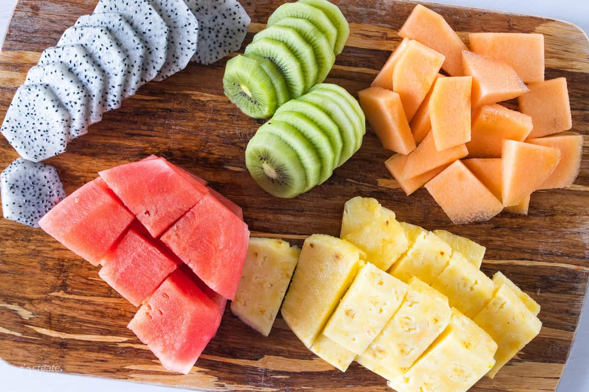 Sliced fruit on a cutting board