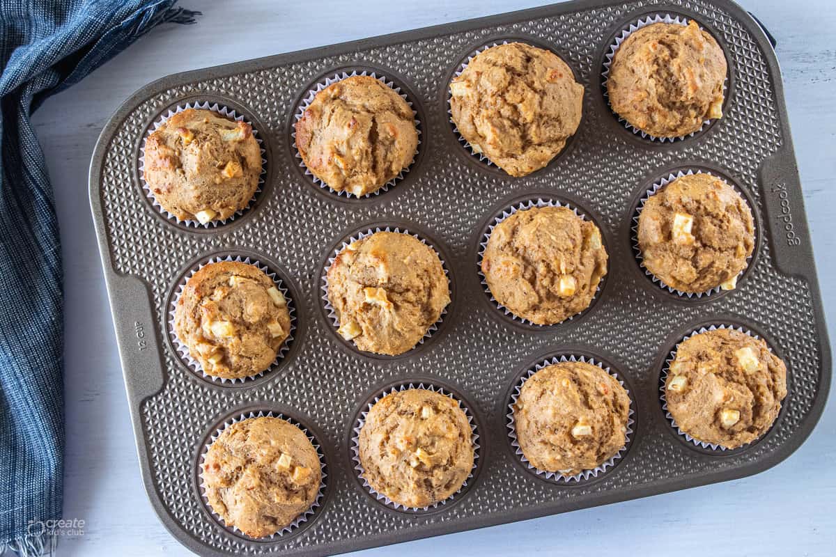apple muffins in muffin tin