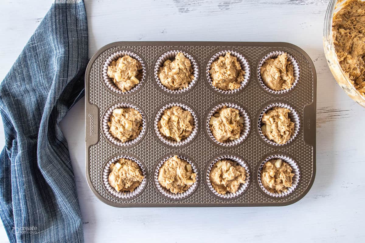 muffin batter in muffin tin