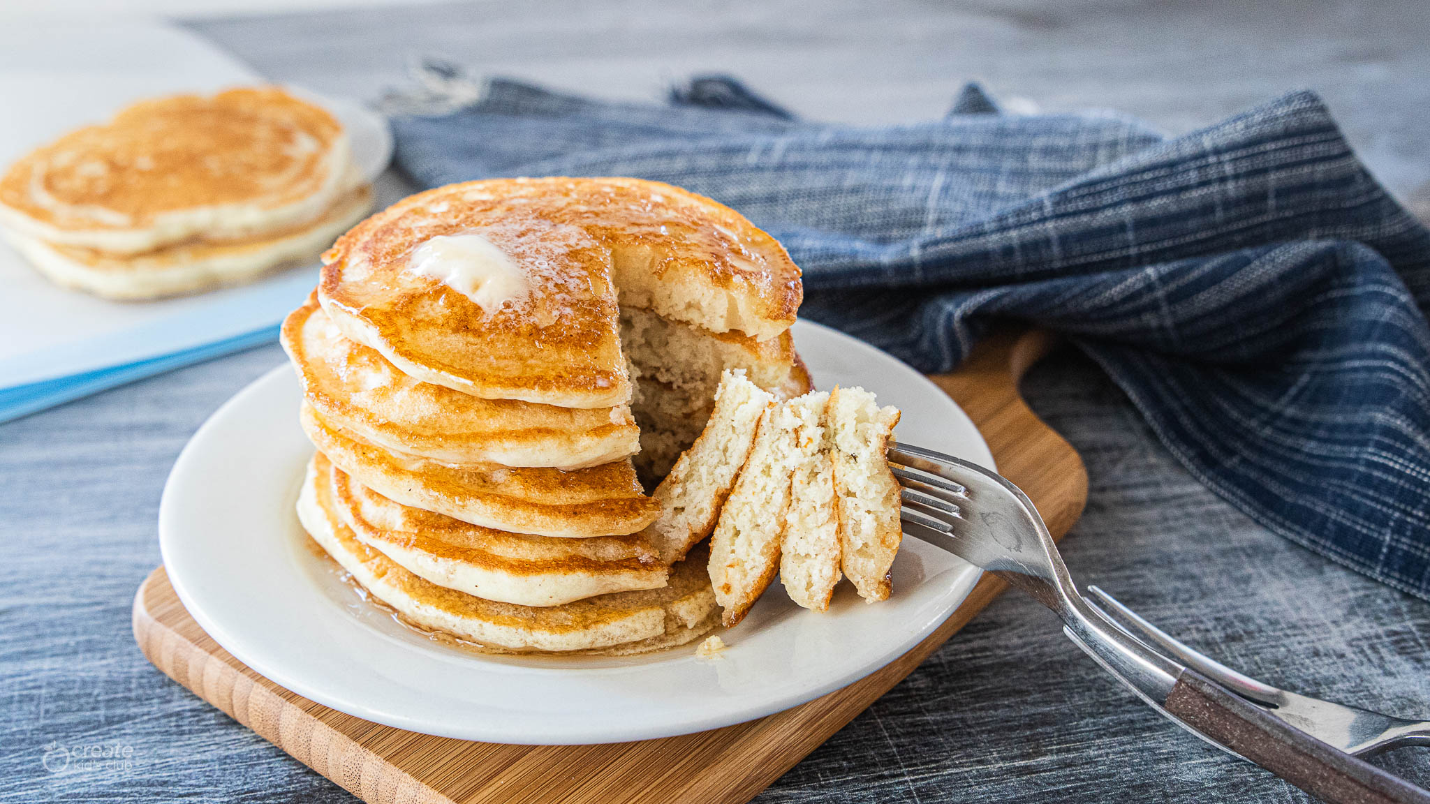 pancakes on plate with fork