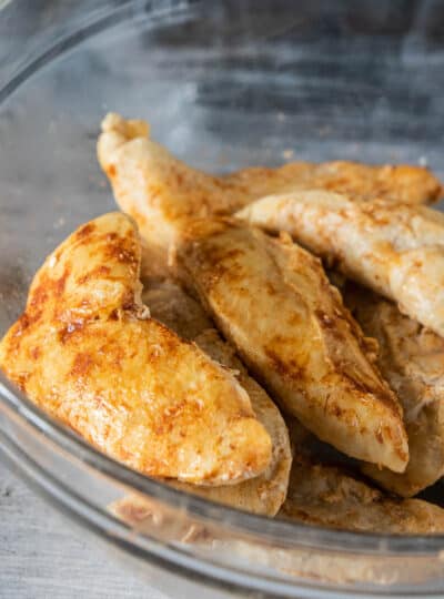 cooked chicken tenderloins in bowl