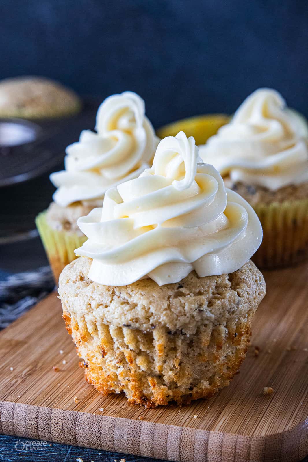 cupcakes with lemon cream cheese icing on top 