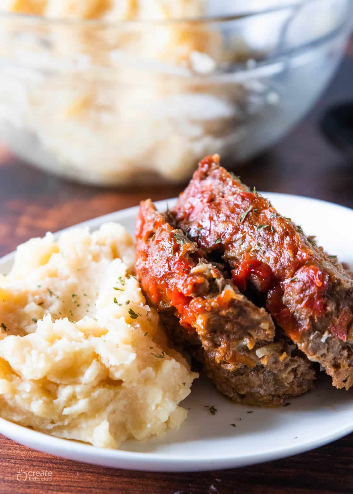 meatloaf on plate with mashed potatoes
