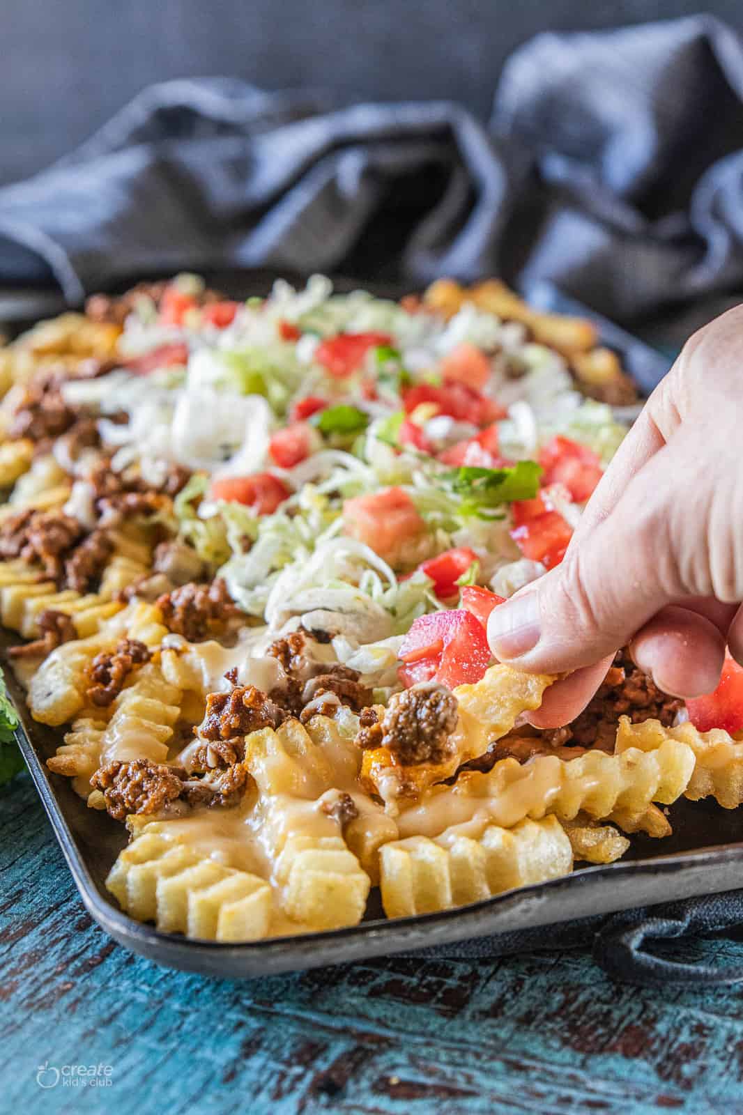 nacho fries on a baking dish