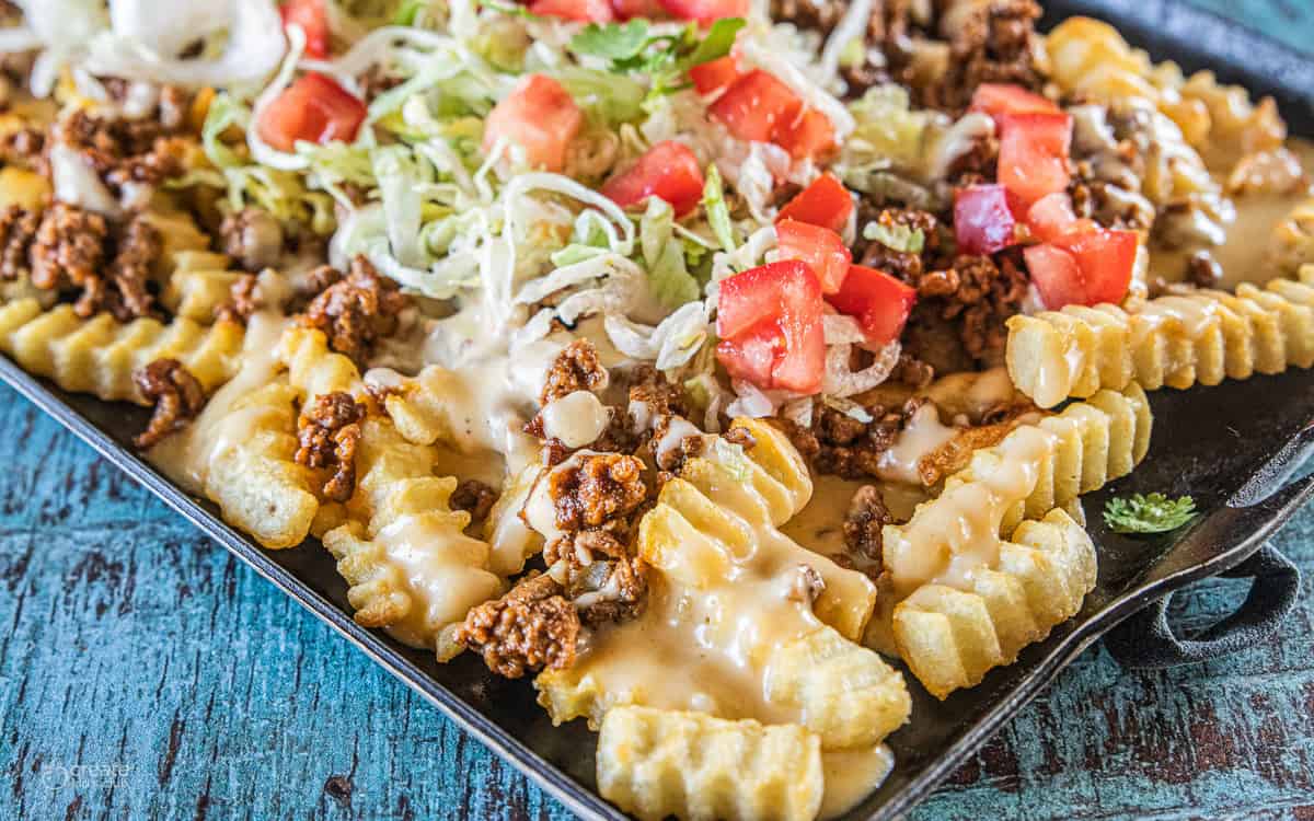 nacho fries on a baking dish