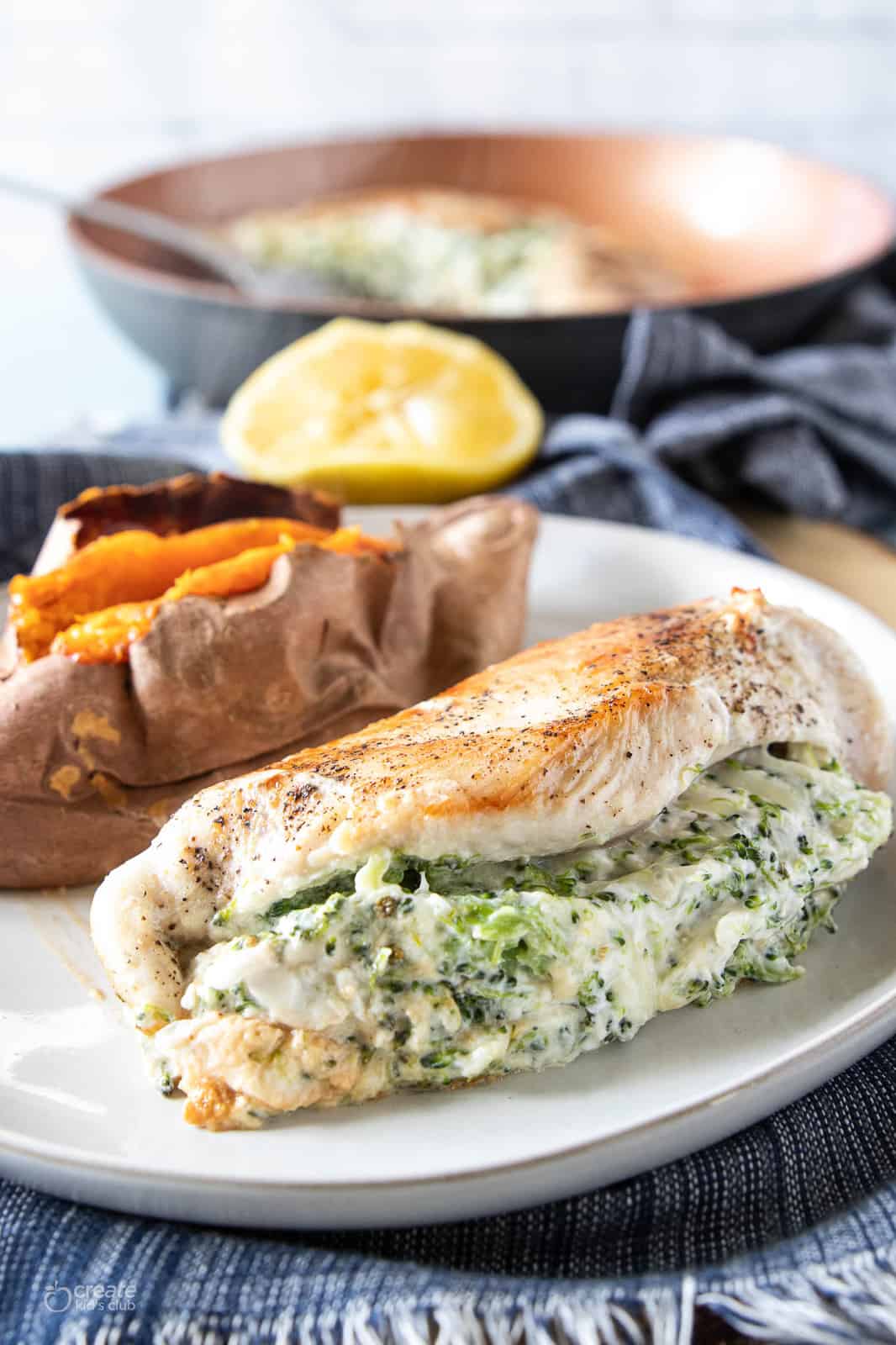 veggie and cheese stuffed chicken on plate