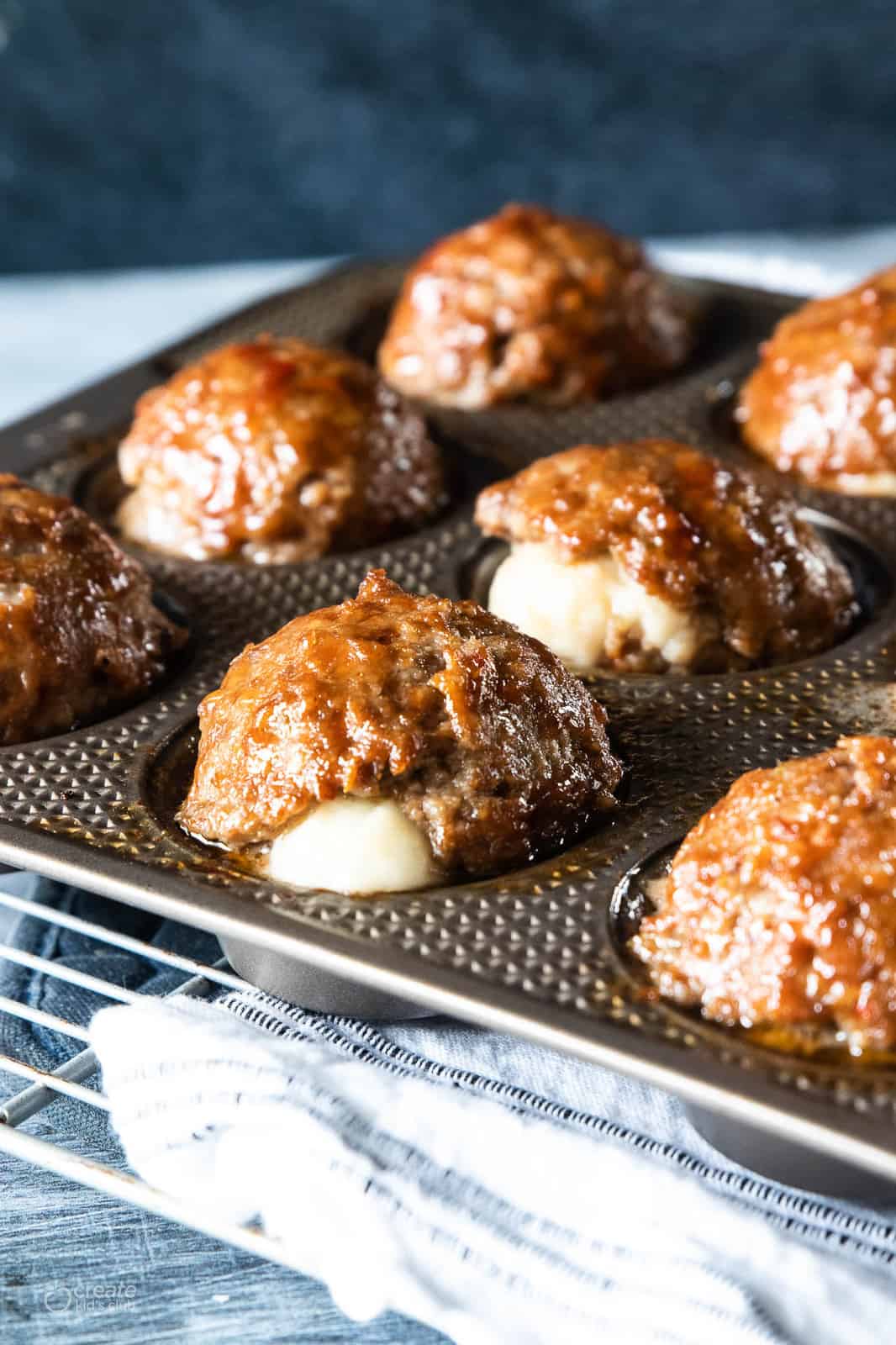 meatloaf and mashed potato bites in muffin tin