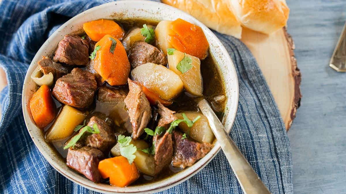 stew in bowl with spoon