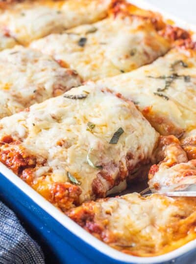 sliced lasagna in baking dish