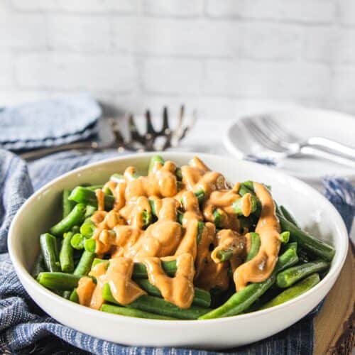 peanut sauce drizzled over green beans