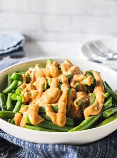 peanut sauce drizzled over green beans