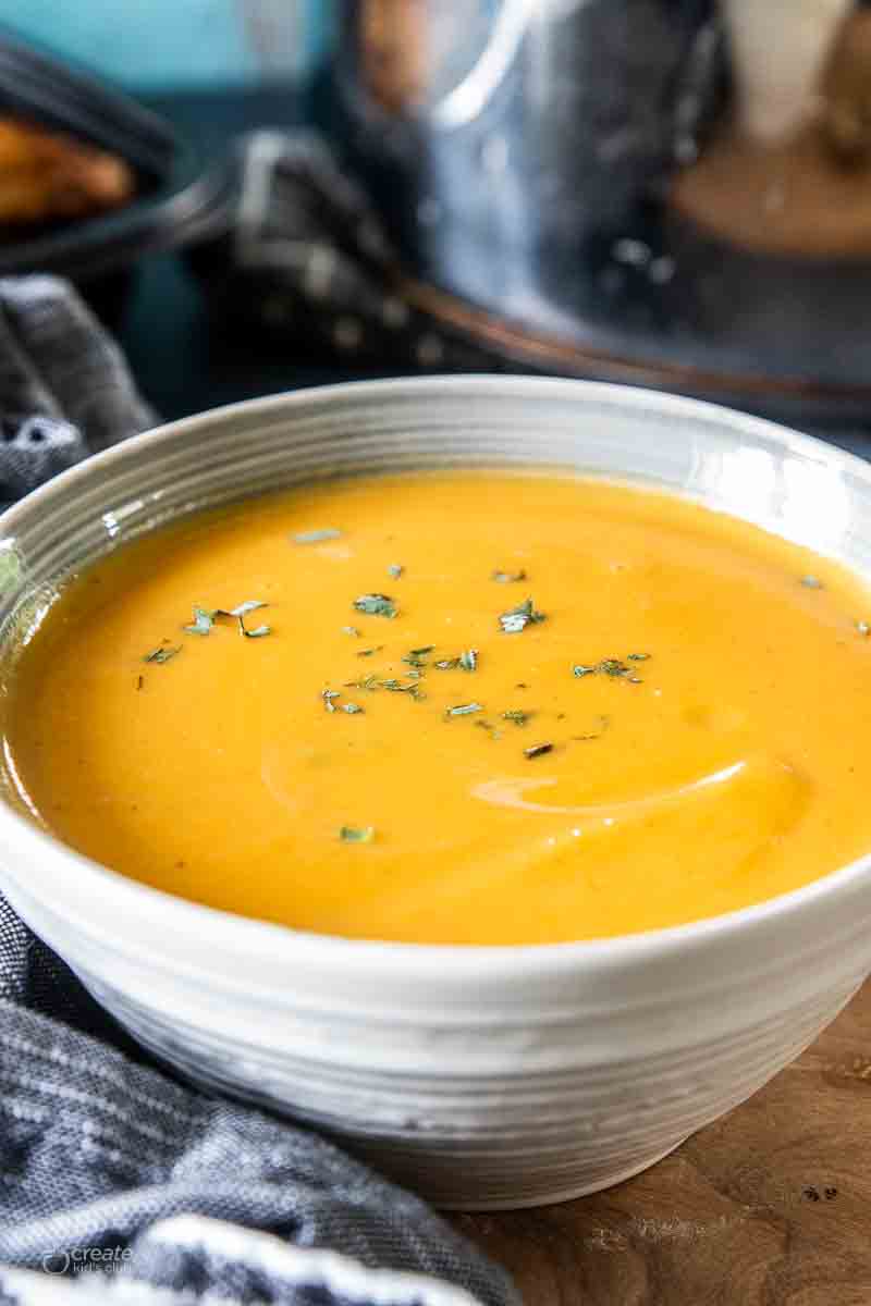 butternut and sweet potato soup in a bowl