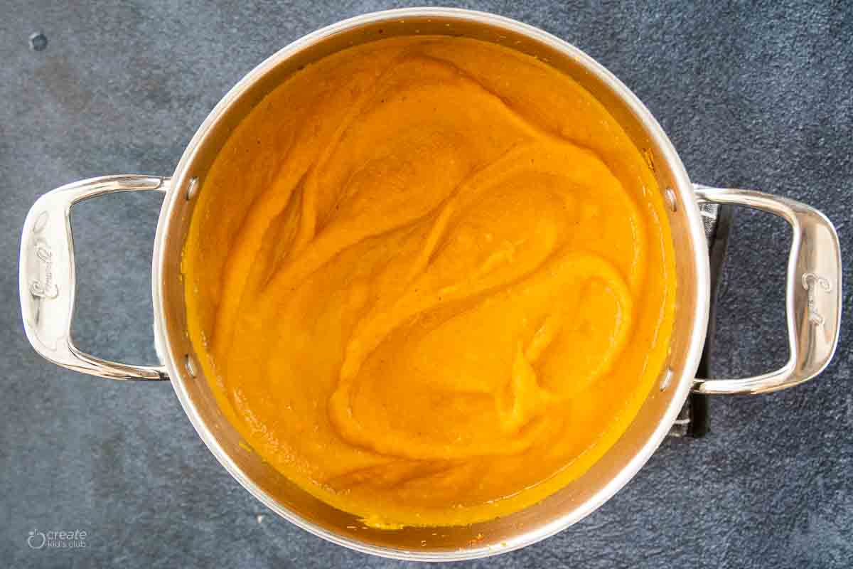butternut squash and sweet potato soup in stock pot