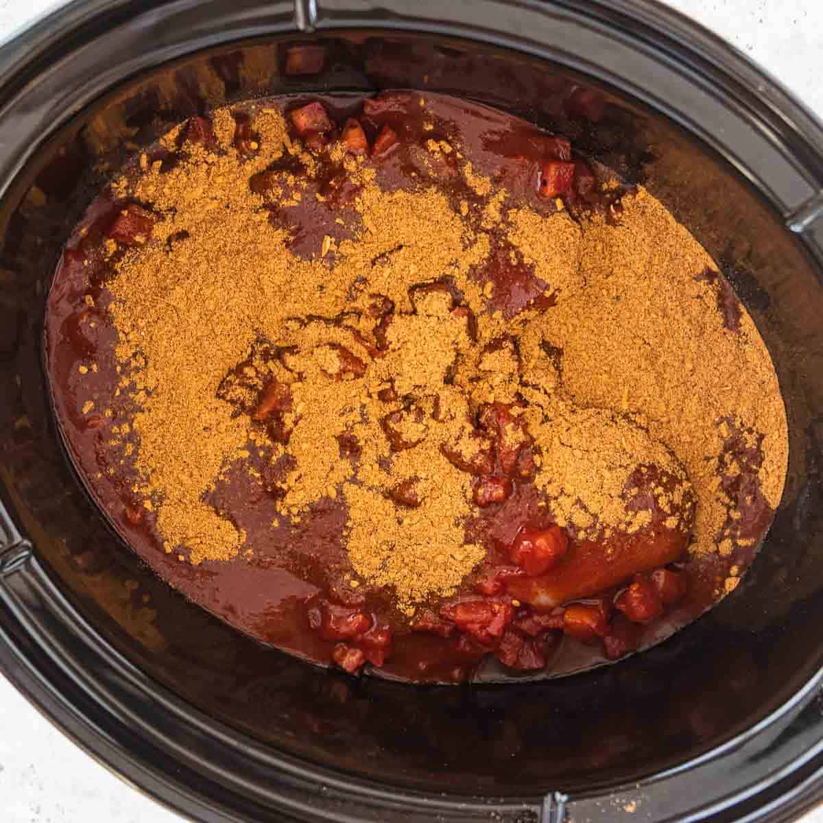 spices added to crockpot enchiladas