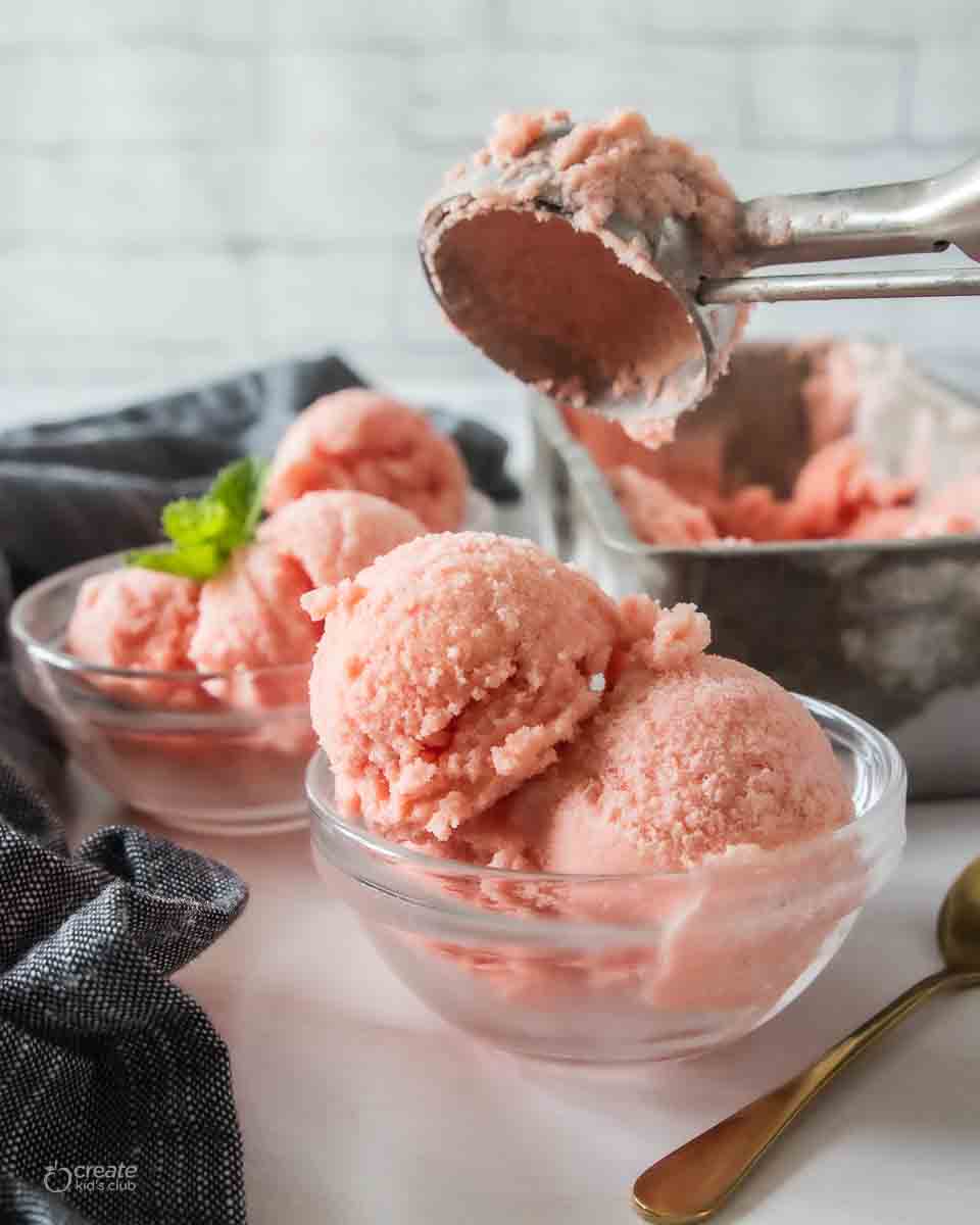 scooped watermelon ice cream in dish