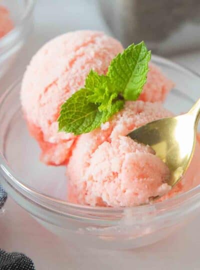 scooped watermelon ice cream in dish