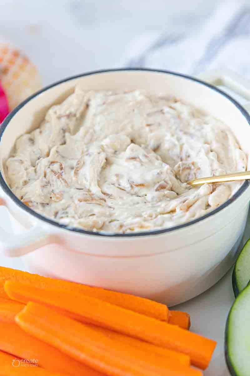 sweet onion dip in bowl with spoon