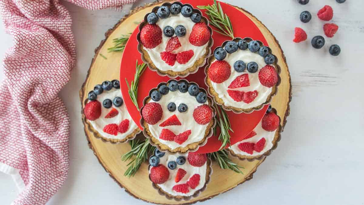 Christmas fruit tarts stacked on stand