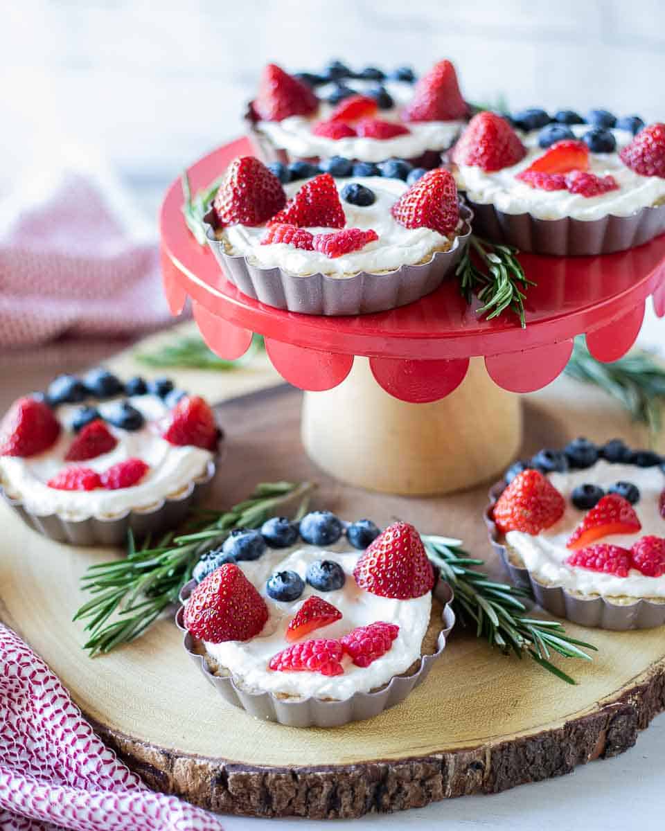 Christmas fruit tarts on a cake stand