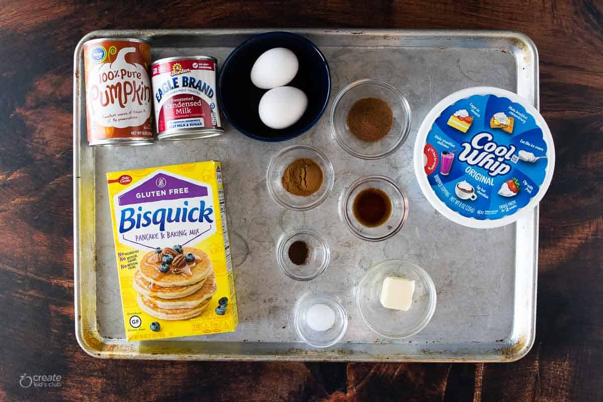 ingredients for gluten free pumpkin pie on baking sheet