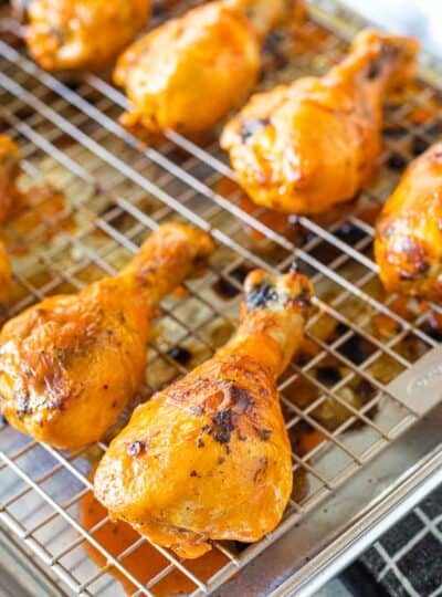 buffalo chicken leg baked on a wire rack