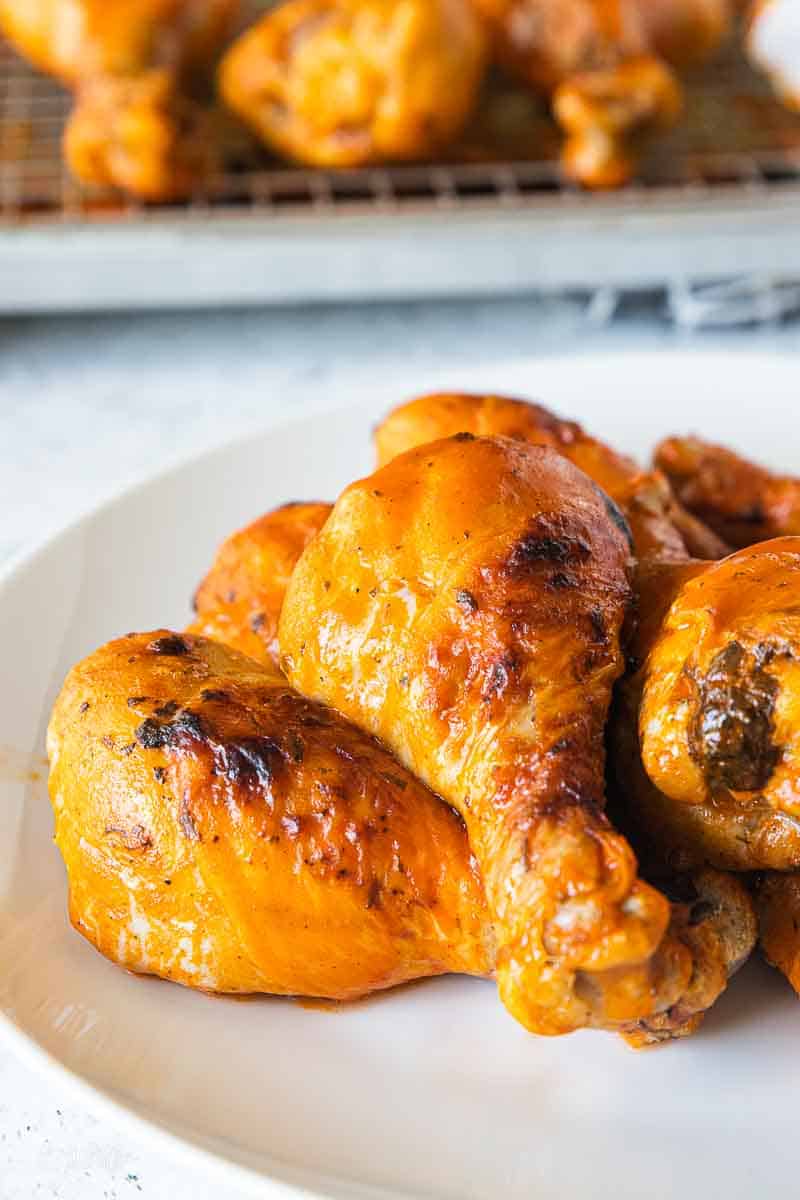 buffalo chicken legs on a serving plate