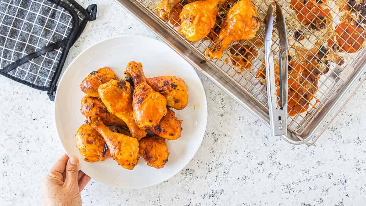 buffalo chicken legs on a serving plate