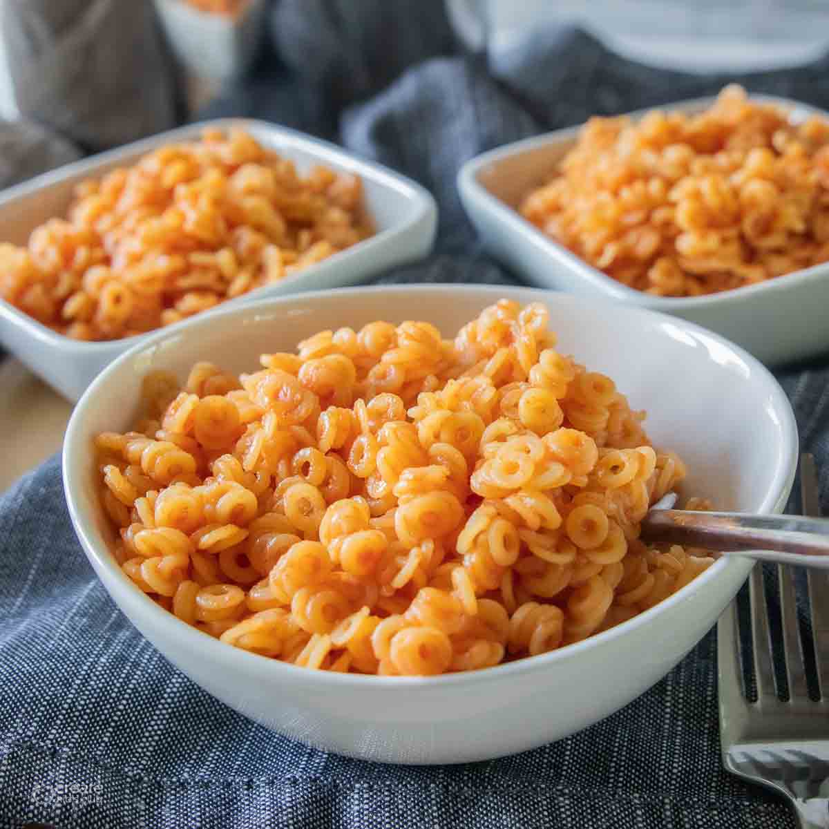 gluten free homemade spaghetti o's in bowl with fork