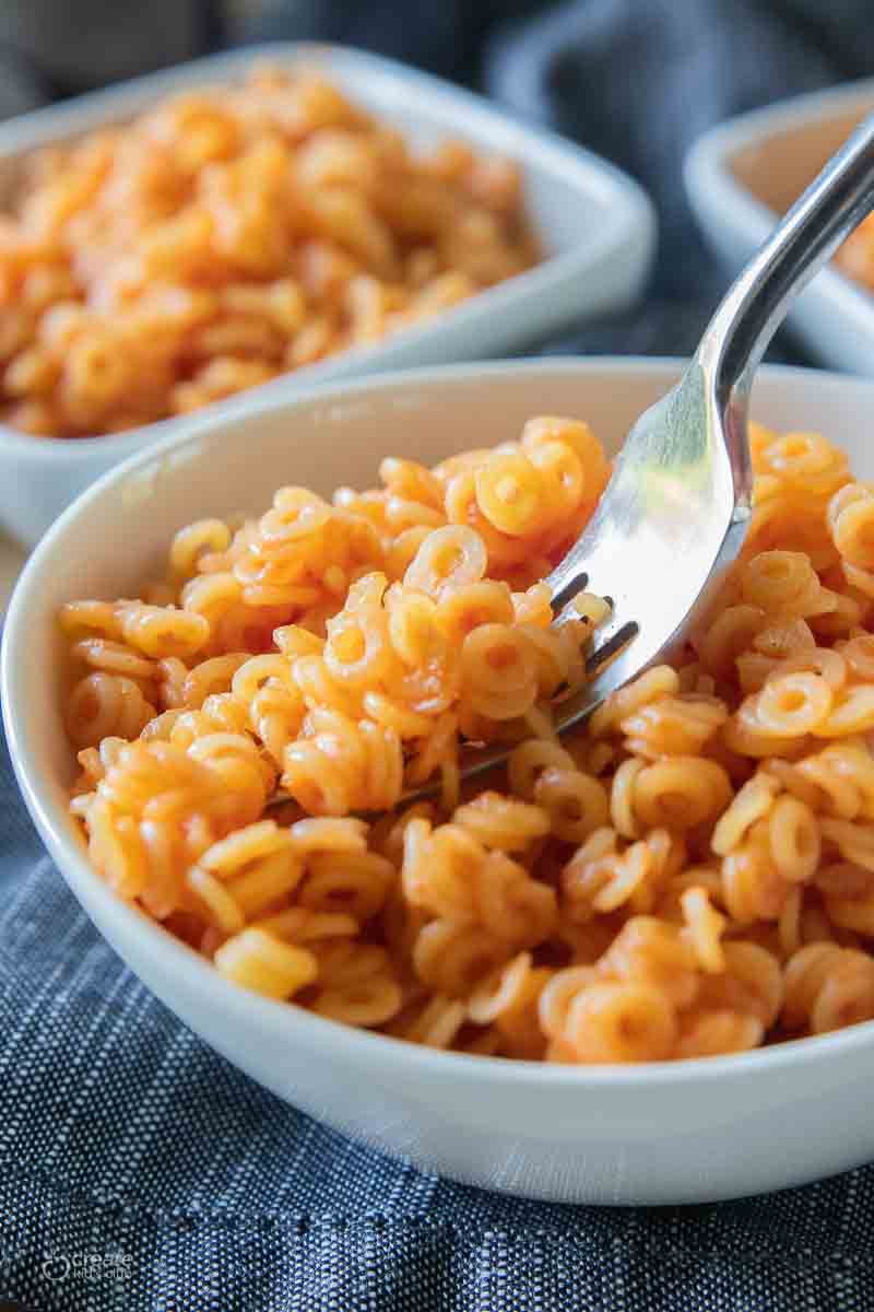 fork scooping up a bite of homemade spaghetti o's