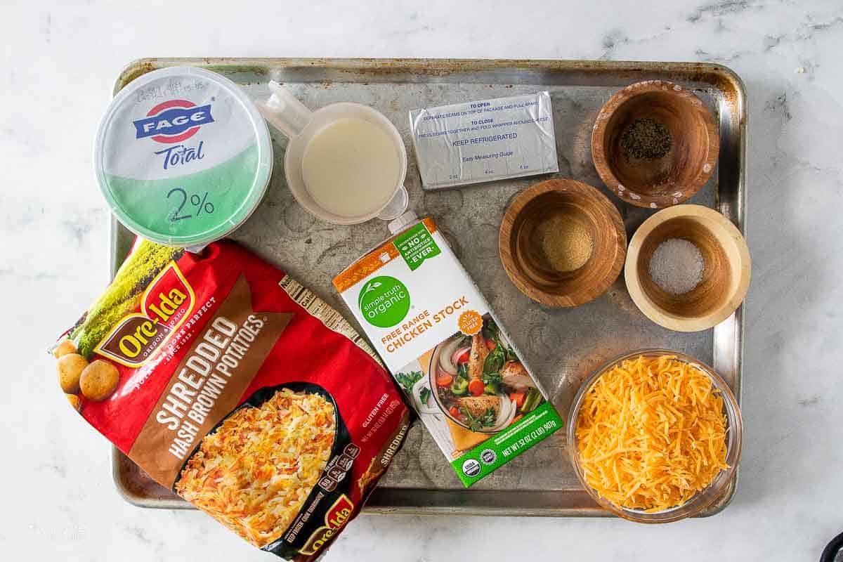 ingredients for gluten free cheesy potatoes on sheet pan