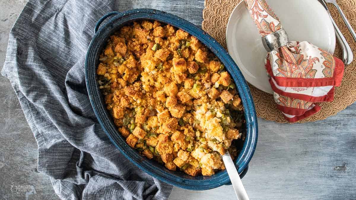 spoon in dish filled with gluten-free cornbread stuffing
