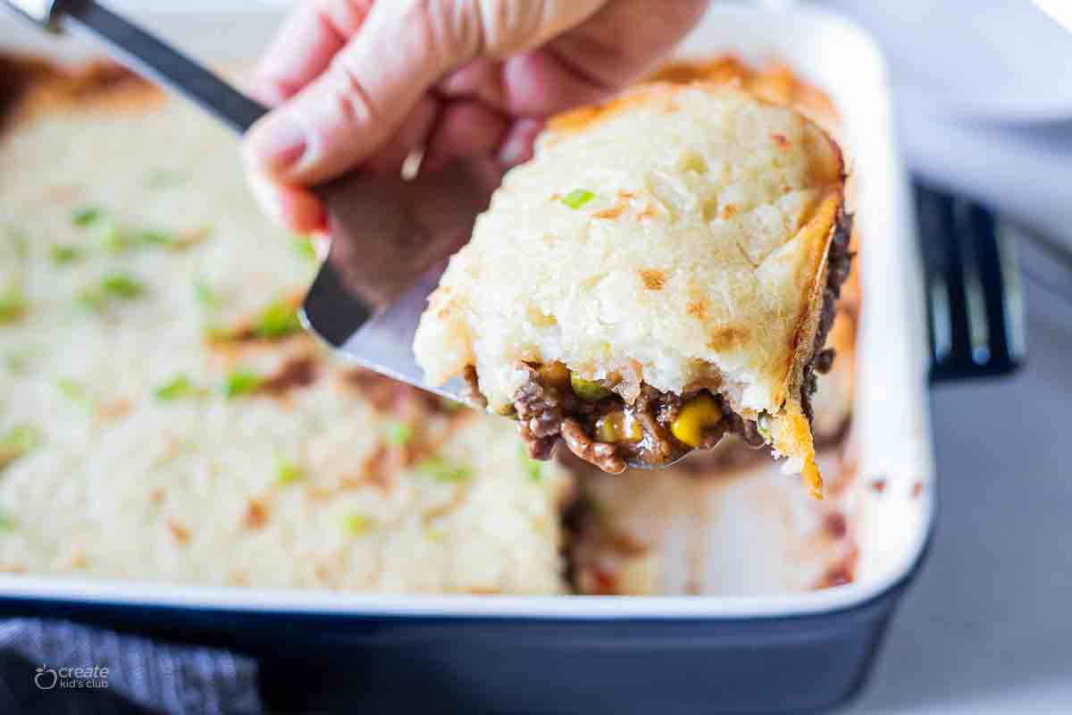 spatula removing slice of gluten free shepards pie