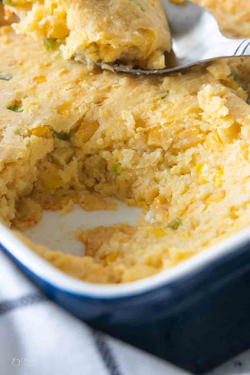 serving of corn casserole scooped from dish