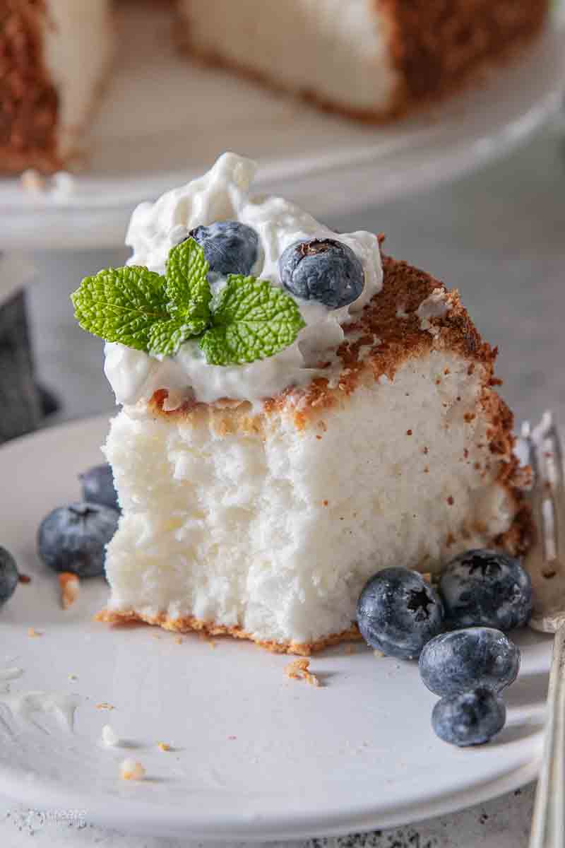 slice of angel food cake with missing bite