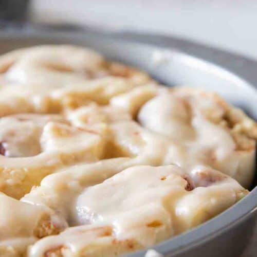 baked cinnamon rolls in a baking pan