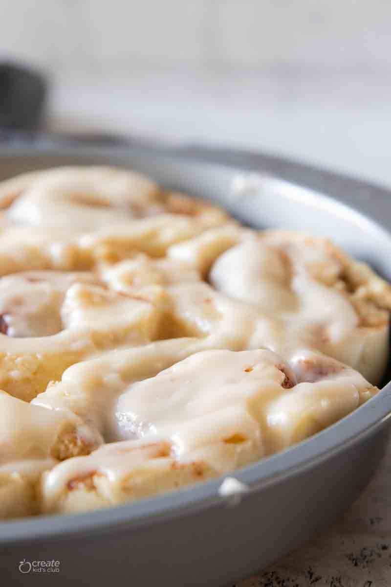 baked cinnamon rolls in a baking pan