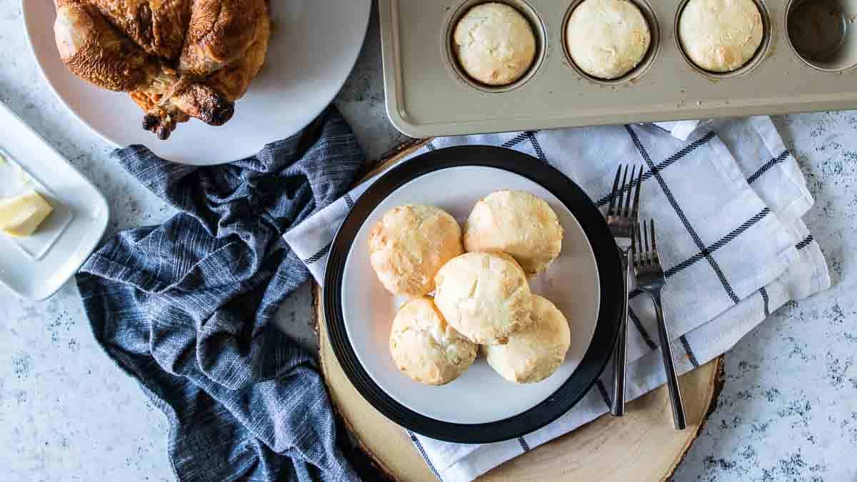 gluten free dinner rolls stacked in a plate