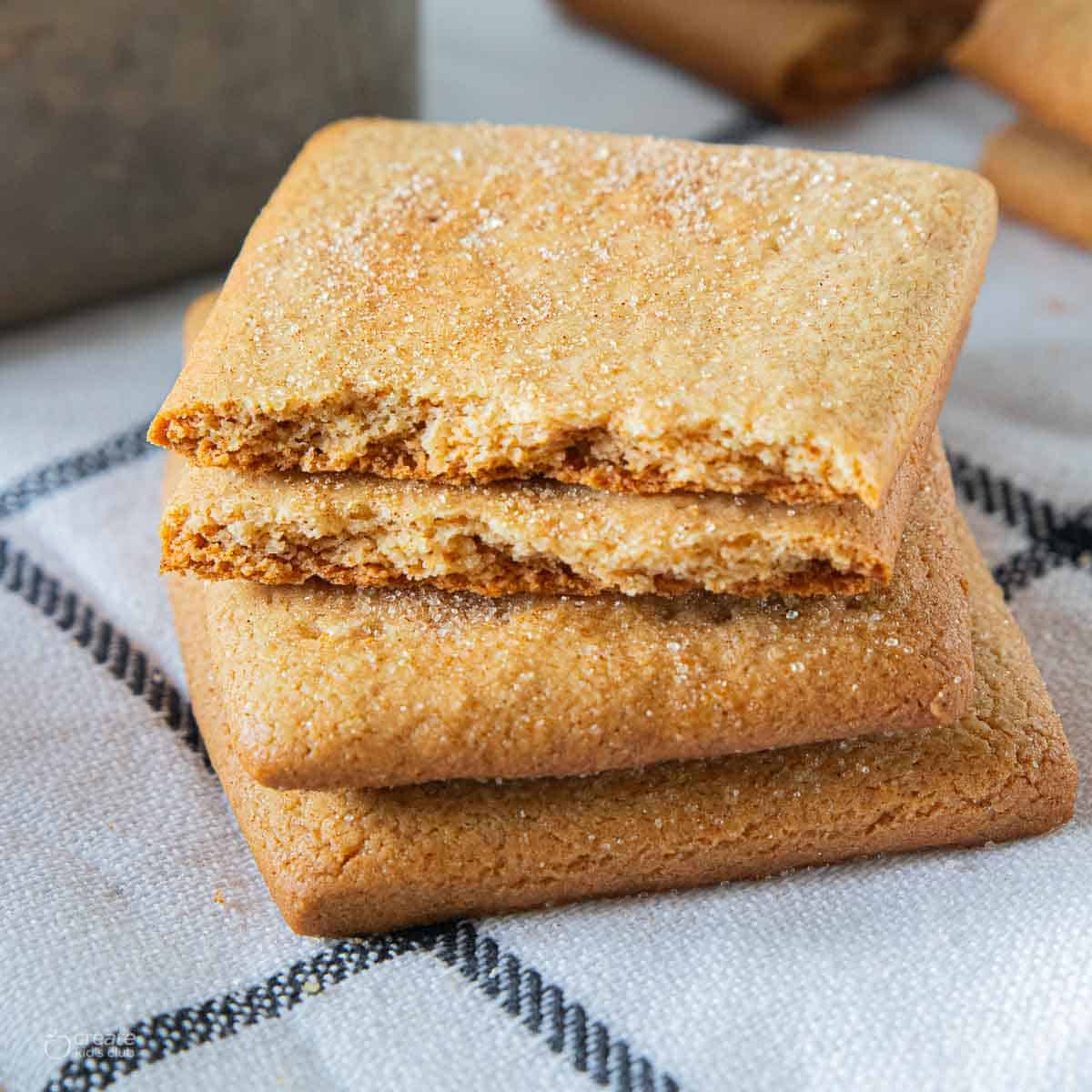 close up view of stacked homemade gluten free graham crackers