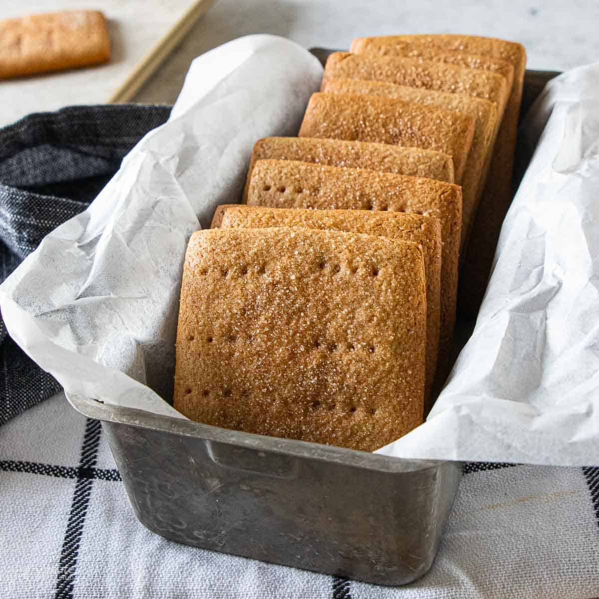 baked homemade graham crackers in a loaf pan