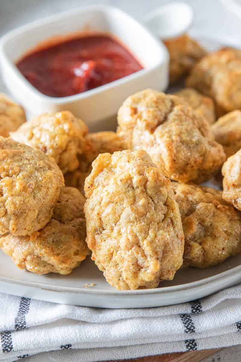 gluten free chicken nuggets next to dipping sauce