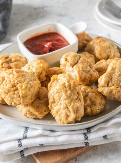 gluten free chicken nuggets next to dipping sauce