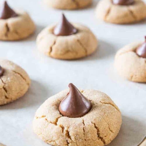 peanut butter blossoms gluten free on baking sheet