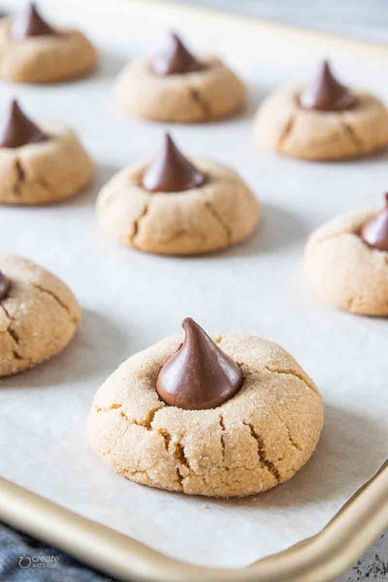 peanut butter blossoms gluten free on baking sheet