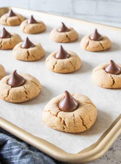 gluten free peanut butter blossoms on baking sheet