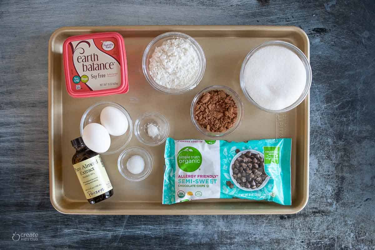 ingredients for dairy free brownies on a baking sheet