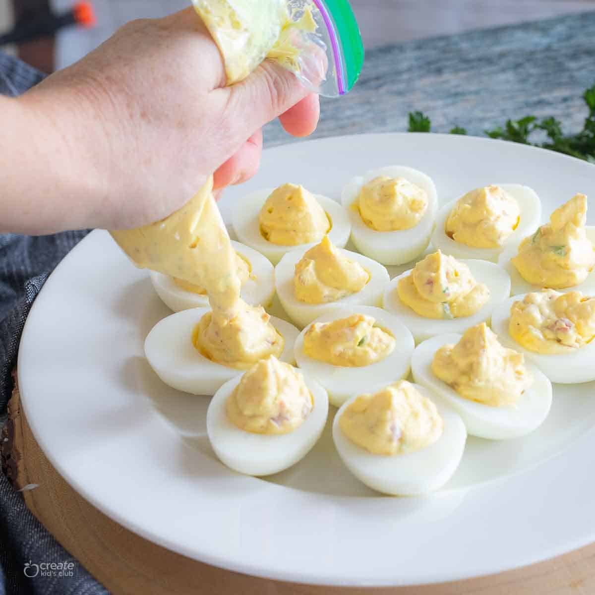 ziploc piping bag filling cooked egg whites